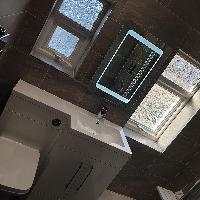 New bathroom with dark tiles